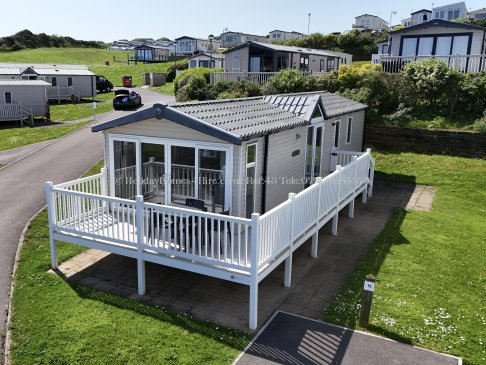 Front exterior view of sea view lodge at Reighton Sands – ref 43