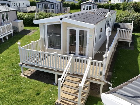 Exterior view of 2-bedroom lodge at Reighton Sands – ref 26