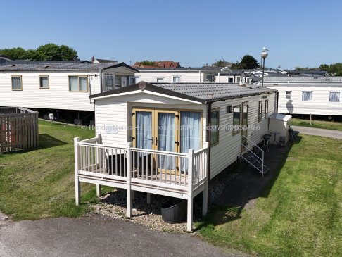 Front view of 3-bedroom caravan for hire at Reighton Sands – ref 73
