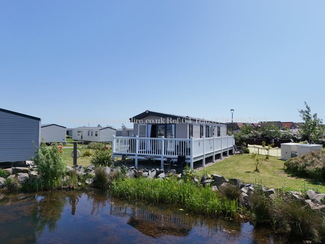 Exterior view of 2-bedroom lakeside lodge hire at Haven Primrose Valley – ref 64