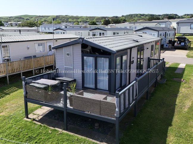 Side view of 2-bedroom lodge for hire at Haven Holidays Reighton Sands – ref 38